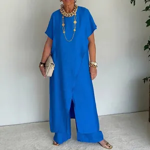 Elegante set tunica asimmetrica e pantaloni larghi coordinati in blu reale chic