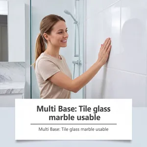 Woman touching glossy white tiles renovated with white waterproof ceramic paint