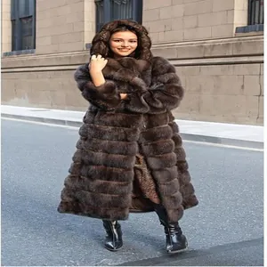 Full view of an elegant long brown faux fur hooded coat designed for winter fashion