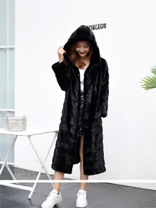 Elegant long black hooded faux fur coat featuring soft mink-like texture for winter