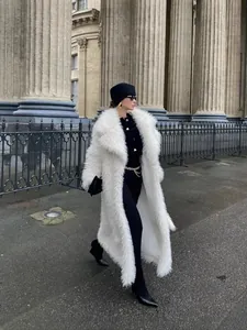 Elegant long white faux fur coat for women with snow fox hair texture in street style