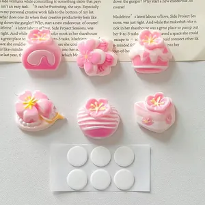 Close-up detail of cute 3D pink cherry blossom cake resin DIY accessories set