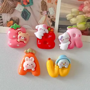 Detailed macro view of cute cartoon animal and fruit shaped resin charms for DIY craft projects
