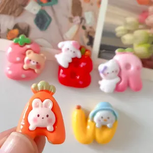 Close-up of cute cartoon animal letter resin charms for DIY phone cases and shoe accessories.