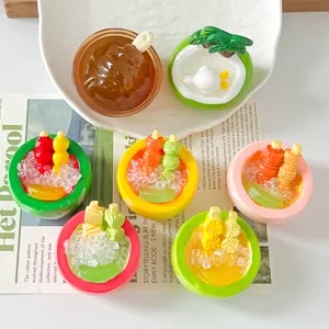 Detail view of assorted miniature resin dessert bowls and food play magnets