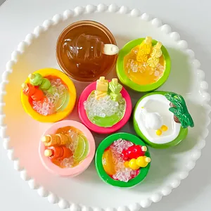 Close-up view of colorful resin miniature food bowls for DIY phone case decoration