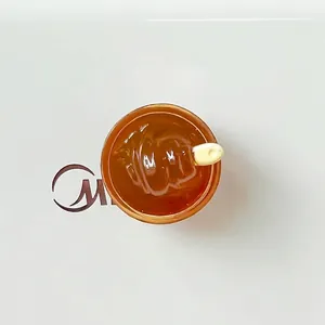 Macro top-down view of miniature mango sago pomelo dessert resin bowl for DIY crafts