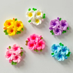 Vibrant collection of colorful resin flower charms with glossy finish for DIY accessories
