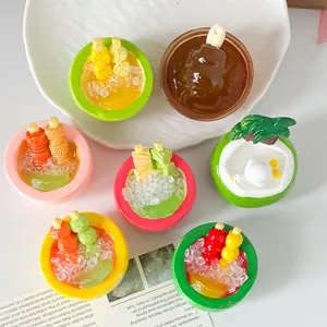 Macro shot of miniature resin food magnets featuring various dessert bowl designs.