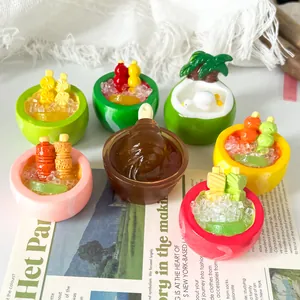 Macro view of colorful miniature resin dessert fridge magnets with realistic fruit designs