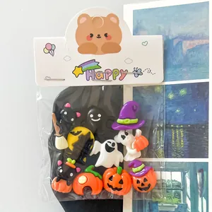 Halloween-themed resin charms set featuring cartoon ghosts and pumpkins.