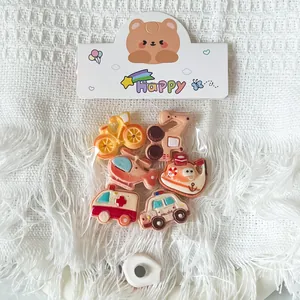Set of cartoon transportation resin accessories for DIY fridge magnets and shoe charms.