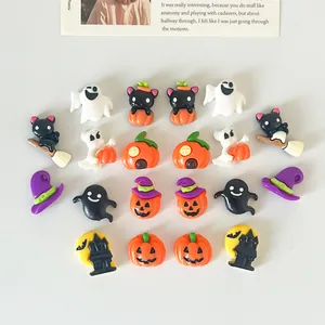Detailed view of various colorful Halloween resin charms for DIY crafts and decor
