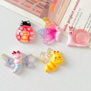 Detailed view of colorful cartoon resin insects for creative DIY crafts and accessories.