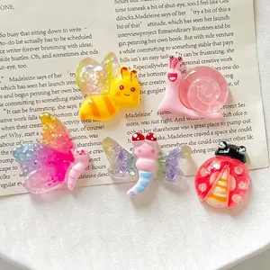 Detailed view showing colorful resin insect charms for DIY jewelry and craft projects