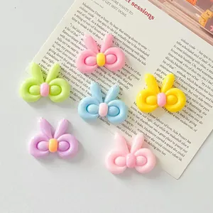 Fiocchi a palloncino in resina colorata per creazioni fai-da-te e accessori di moda.