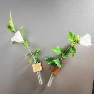 Modern wooden test tube vases for hydroponic plants shown with elegant white flowers