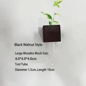 Detail of black walnut wood block with clear glass test tube for hydroponic plants