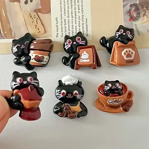 Detailed close-up of cute cartoon cat resin accessories with coffee theme for DIY