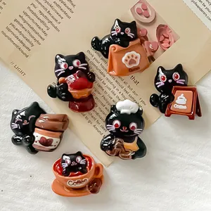 Close-up of cute resin coffee cat charms for DIY phone cases and fridge magnets