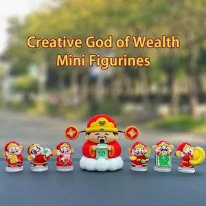 Set of mini cartoon God of Wealth car dashboard ornaments in vibrant red and gold colors