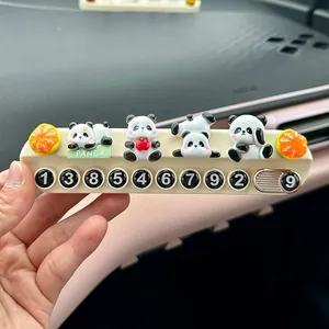 Close-up of a cute panda car temporary parking number plate for dashboard decoration