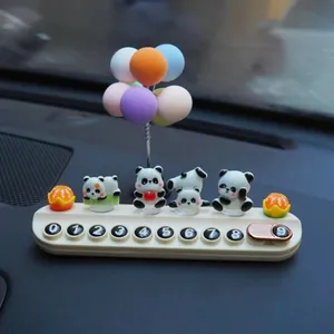 Detailed view of a cute panda-themed car temporary parking phone number plate ornament