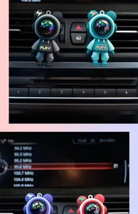 Primer plano de clips de aromaterapia para coche con forma de oso astronauta de colores.