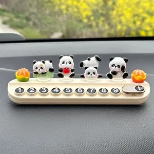 Detailed view of the cute panda themed temporary car parking phone number plate