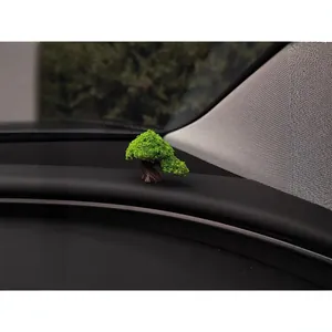 Creative artificial car bonsai ornament for dashboard decoration with healing greenery.
