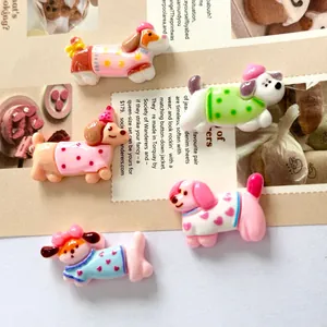 Collection of five colorful flat-back resin dog charms for DIY crafts and accessories