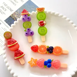 Detailed view of colorful resin fruit skewer charms for DIY crafts and decorations