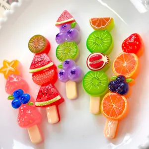 Close-up of colorful resin fruit skewers for DIY phone cases and crafts