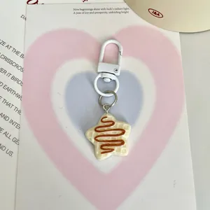Porte-clés gaufre en forme d'étoile en résine avec fermoir mousqueton en métal blanc