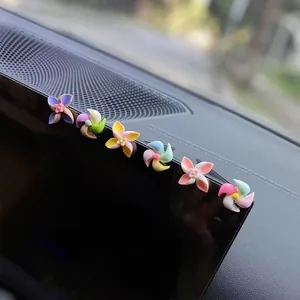 Pegatinas de molinillo giratorio coloridas para el salpicadero y la consola del coche