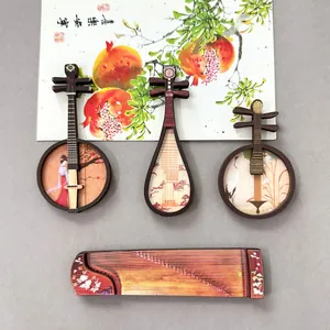 Detailansicht chinesischer Musikinstrument-Kühlschrankmagnete aus Holz wie Pipa und Guzheng