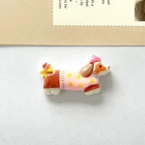 Detailed macro view of a cute resin dog accessory for DIY hair clips and phone cases