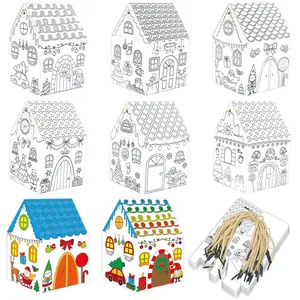 Vielfältige Lebkuchenhaus-Geschenkboxen zum Ausmalen inklusive goldener Kordeln im Set.