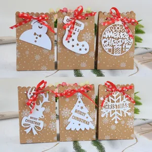 Weihnachten Kraftpapier Geschenktüten Schneeflocken Muster Laserschnitt Karten Rote Schleifen Süßigkeiten Kekse Party Verpackungstüten