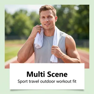 Professional athlete wearing a white cooling towel around his neck on a running track