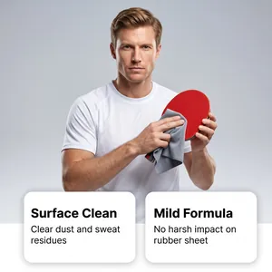 Close-up of cleaning a red table tennis racket with a mild formula solution and cloth