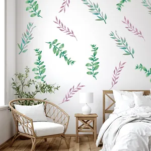 Detail of watercolor green and purple leaf wall stickers applied in a modern bedroom