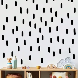Aperçu de stickers muraux à rayures noires abstraites dans une chambre d'enfant cosy