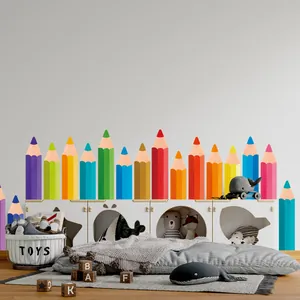 Colorful pencil wall decals used as skirting line stickers in a children room scene.