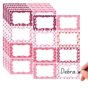 Detailed view of writing on Valentine's Day heart-themed blank name label stickers