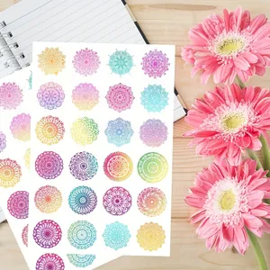 Close-up detail of 24 colorful mandala round stickers for diary and scrapbooking decor