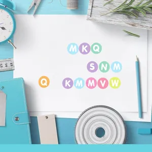 Close-up of 0.5-inch colorful alphabet dot stickers for DIY journaling and crafts