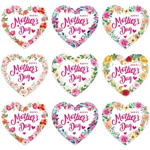 Detail view of heart-shaped Mother's Day floral stickers for gift sealing