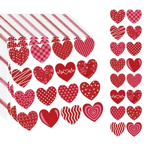 Multiple heart-shaped sticker designs featuring various red and pink decorative patterns