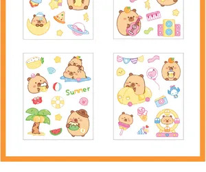 Detailed view of four sheets featuring cute cartoon capybara PET stickers for DIY deco